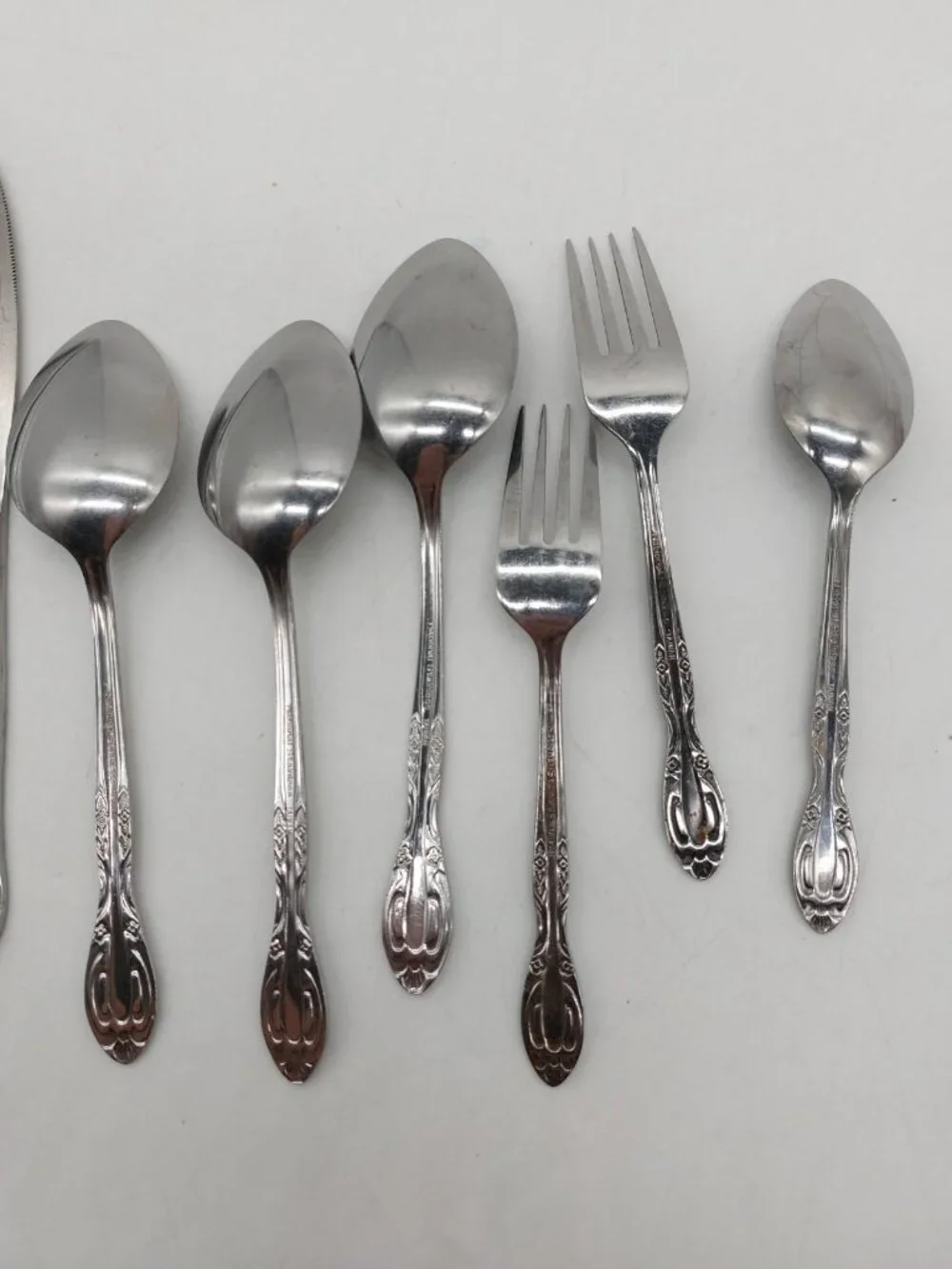 Northland Korea Stainless Flatware w Roses Spoons Knives Forks Lot Of 9